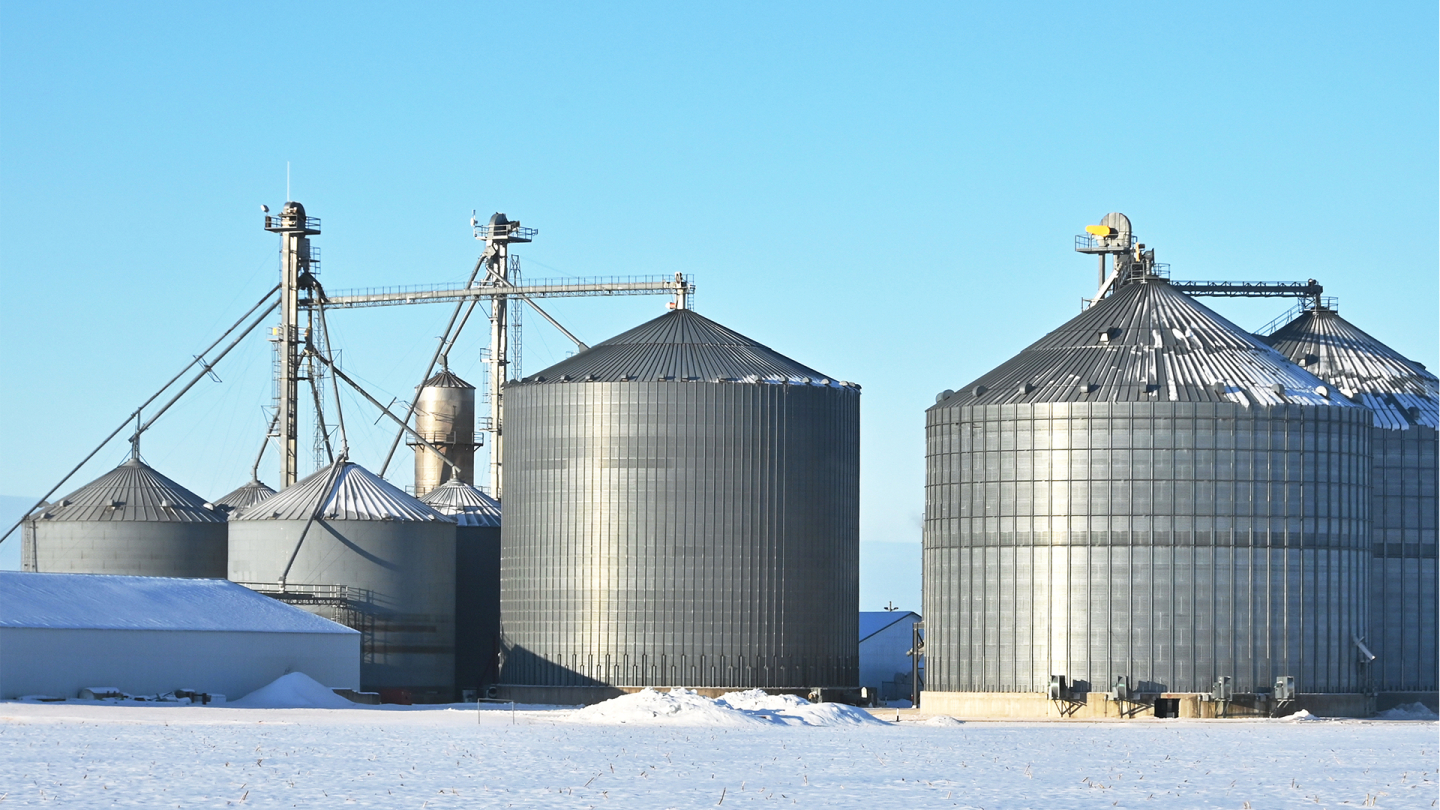 Grain bins in the winter